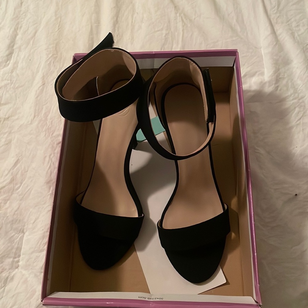 Short heeled black heel